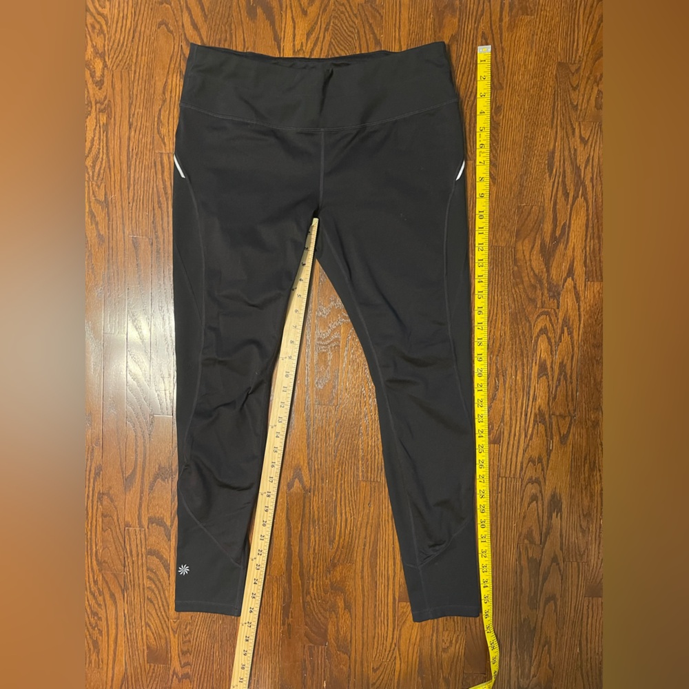 Athleta lightly fleece lined tights.  Size L.